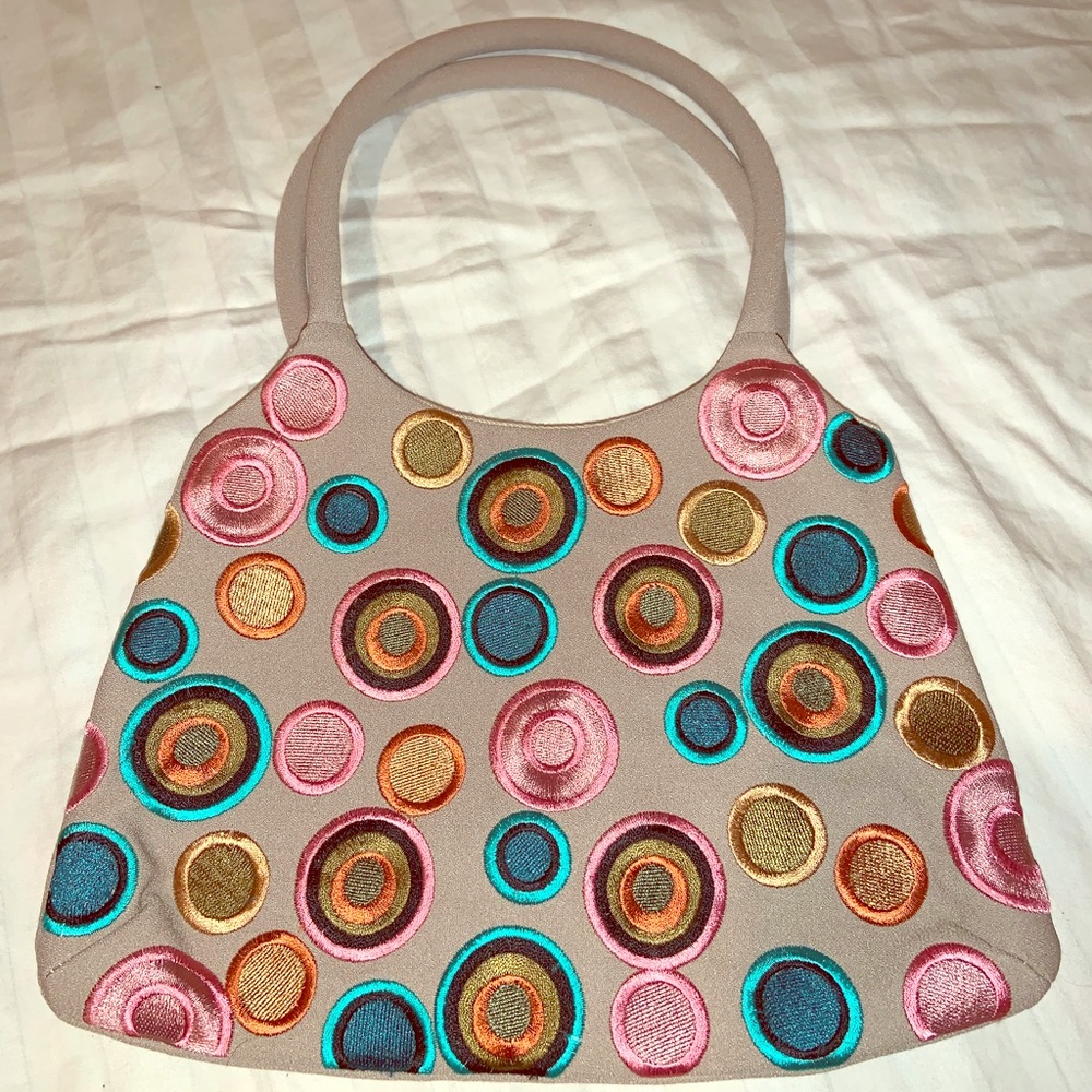 Spectacular small colored NEW hand bag